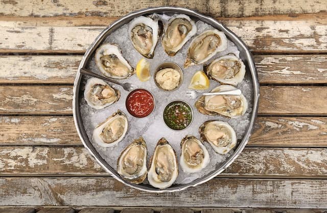 Celebrate National Oyster Day at City Oyster with Champagne & Delicacies
