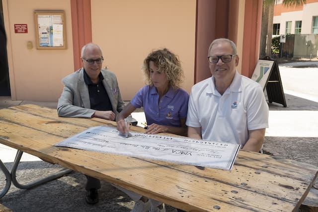 Community Honors Kyrie Larry with Grant for Adaptive Swim Program